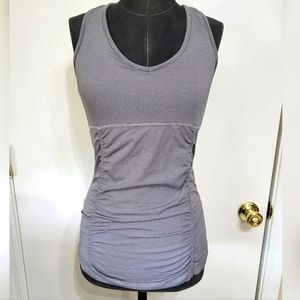 Kyodan workout tank w/ built in bra. Size small. Black and White striped.